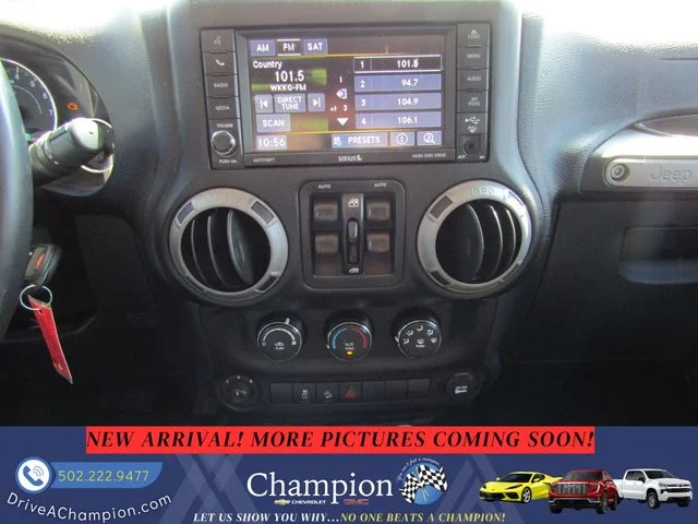 Used 2015 Orange Jeep Unlimited Sport image 14