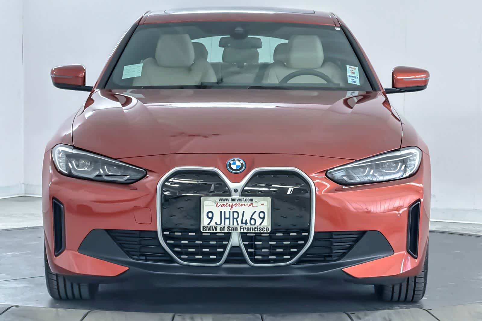 Used 2024 Sunset Orange Metallic BMW eDrive40 image 10