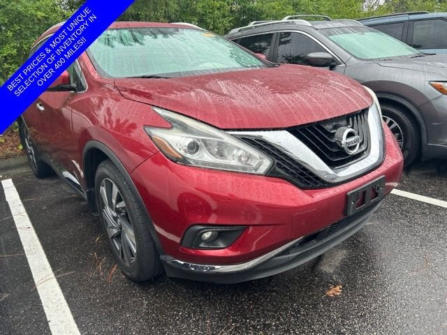 Used 2016 Red Nissan Platinum image 1