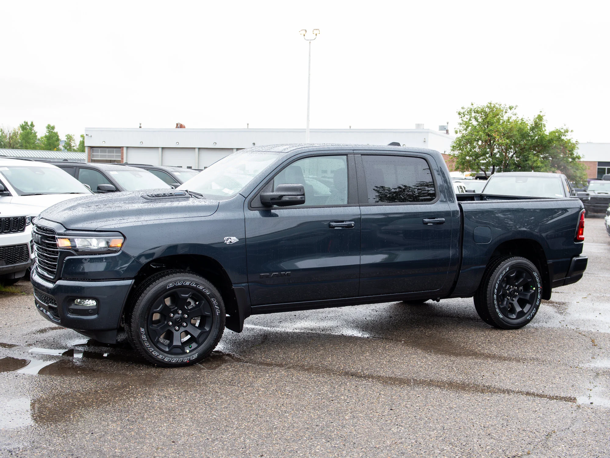 New 2026 Blue RAM Sport* Crew Cab 4x4, HEMI V8, 3.92 Rear Axle Ratio, Panoramic Sunroof image 2