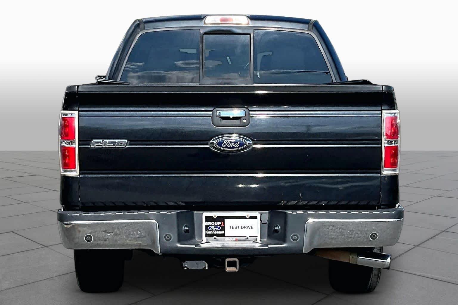 Used 2014 Tuxedo Black Metallic Ford XLT image 4