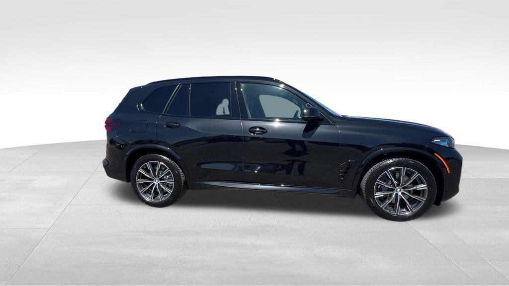 New 2026 Black Sapphire Metallic BMW xDrive50e image 13