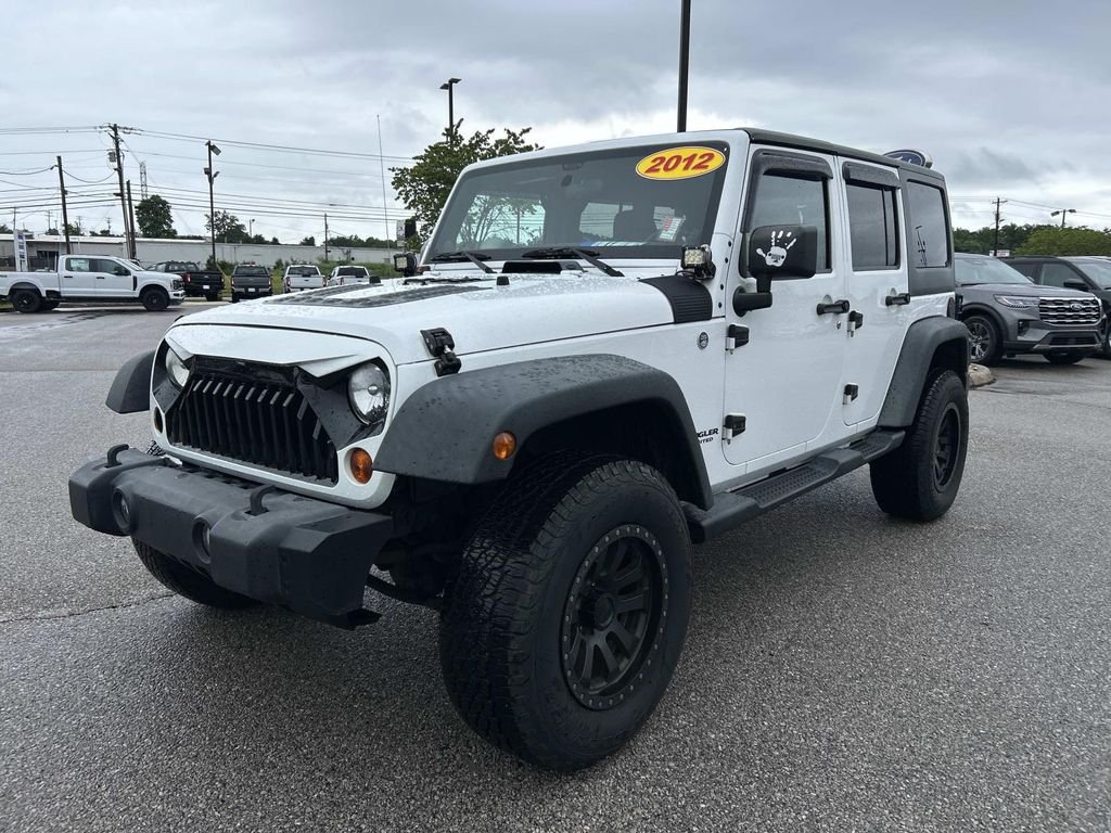 Used 2012 Bright White Jeep Unlimited Sport image 8