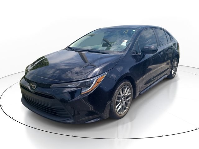 Used 2024 Black Toyota LE image 2