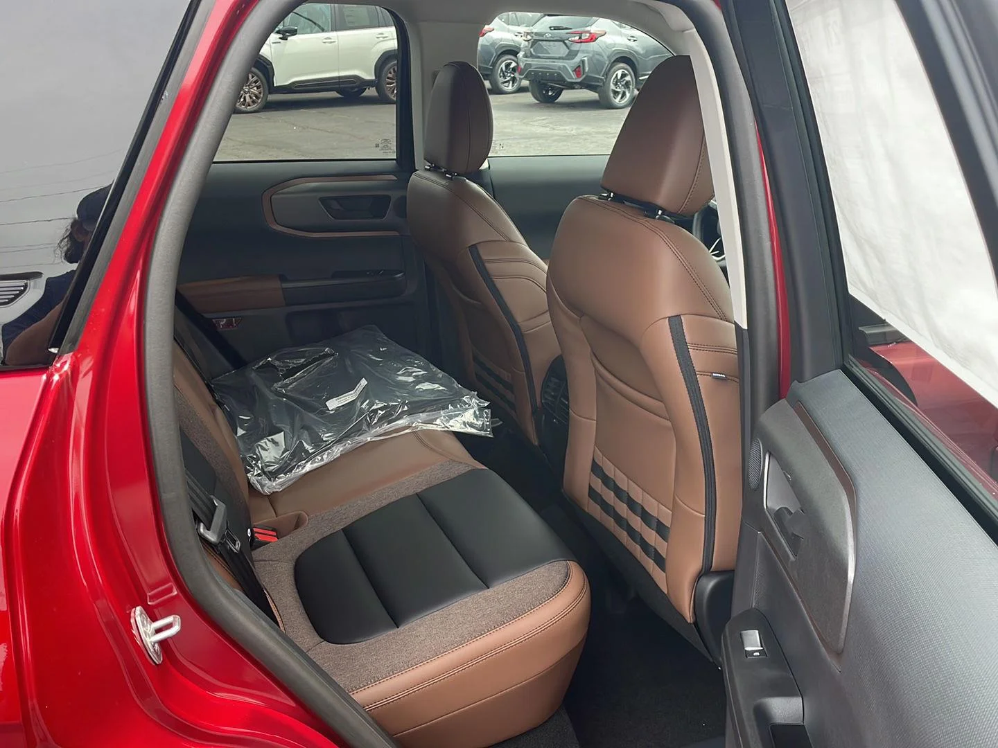 New 2026 Ruby Red Metallic Tinted Clearcoat Ford Outer Banks image 24