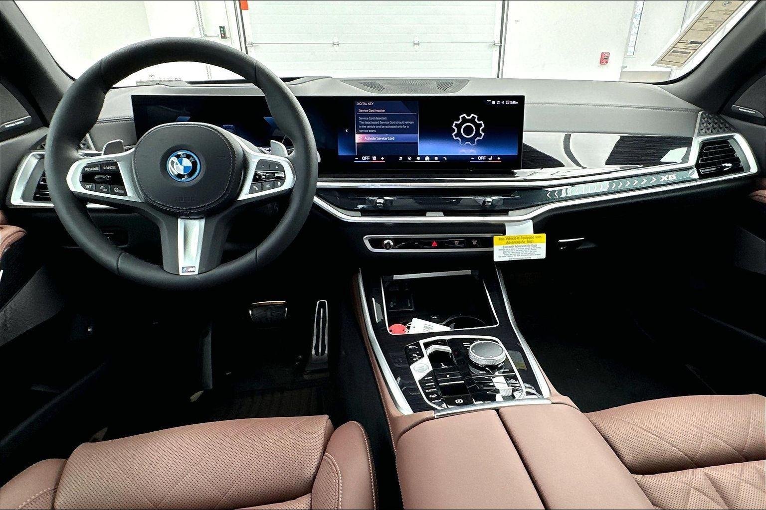 New 2026 Black Sapphire Metallic BMW xDrive50e image 9