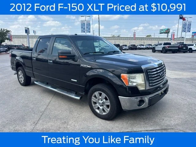 Used 2012 Tuxedo Black Metallic Ford XLT image 1