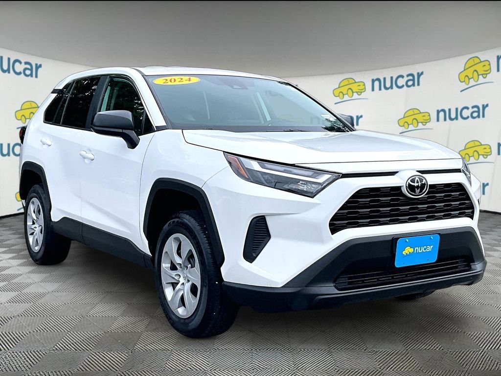 Used 2024 White Toyota LE image 1