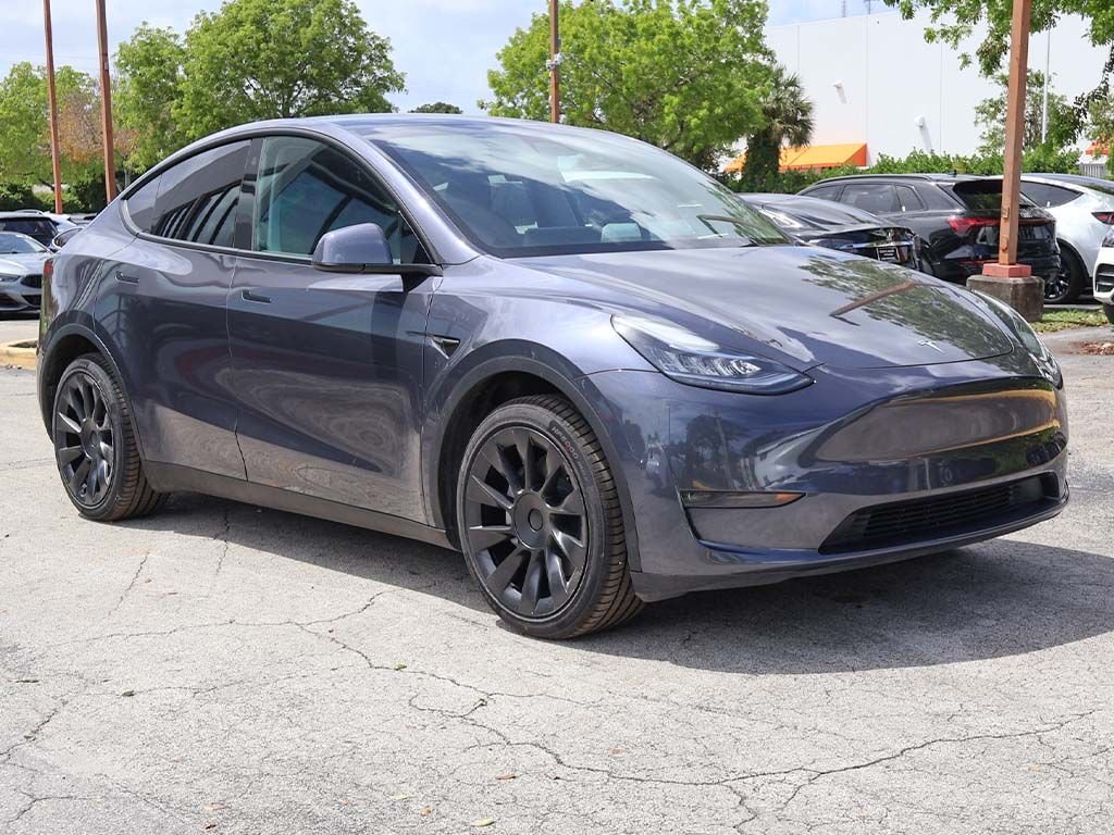 Used 2023 Tesla Model Y Long Range with VIN 7SAYGDEE7PA098885 for sale in Miami, FL