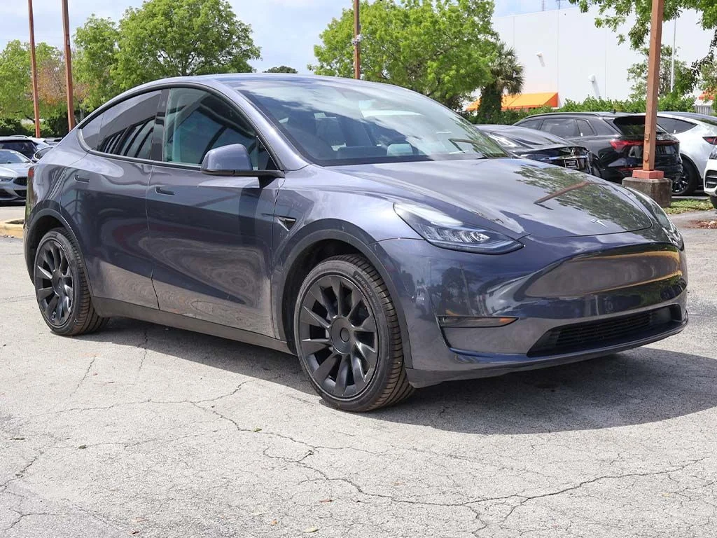 Used 2023 Tesla Model Y Long Range with VIN 7SAYGDEE7PA098885 for sale in Miami, FL