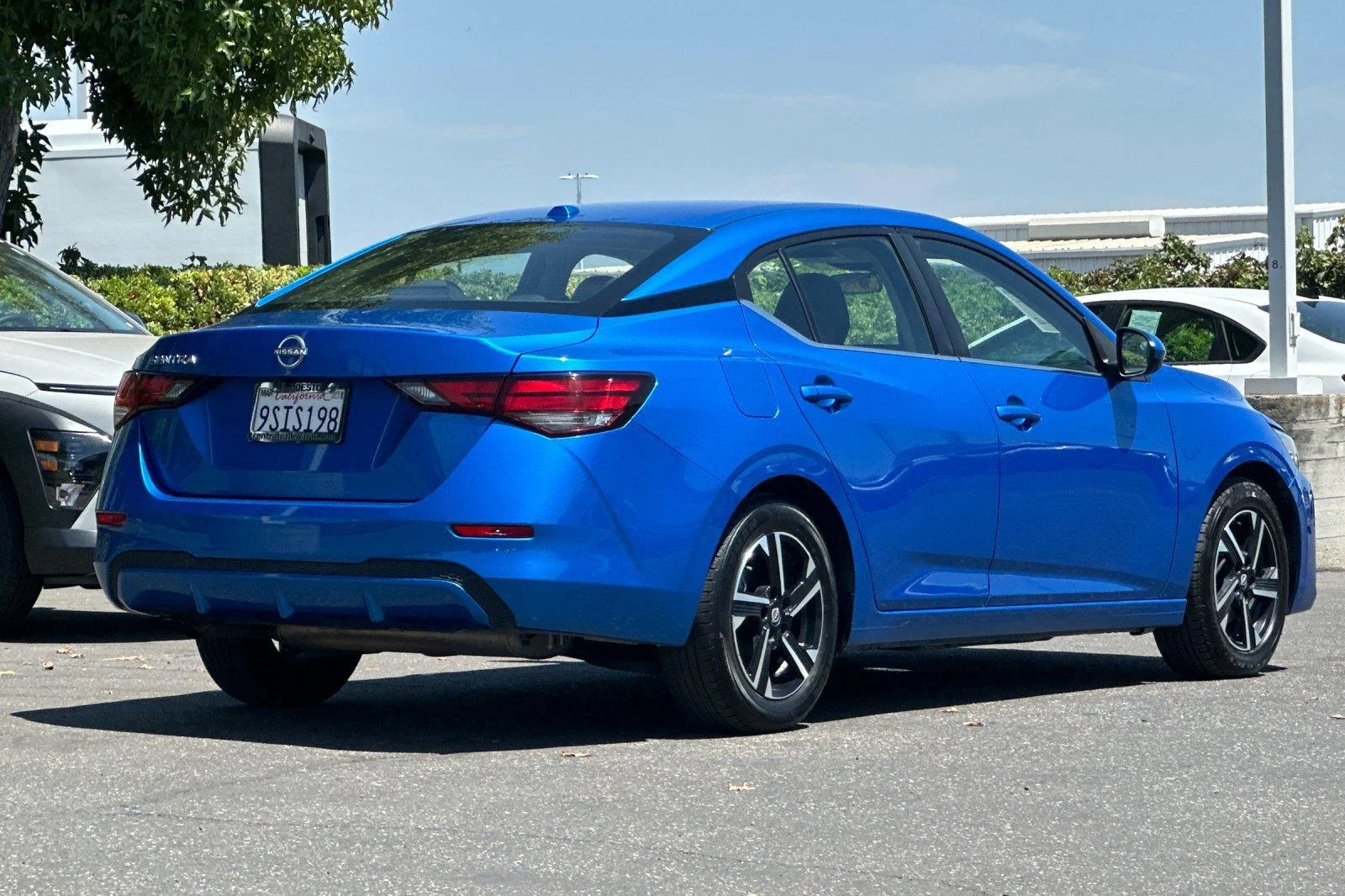 Used 2025 Electric Blue Metallic Nissan SV image 4