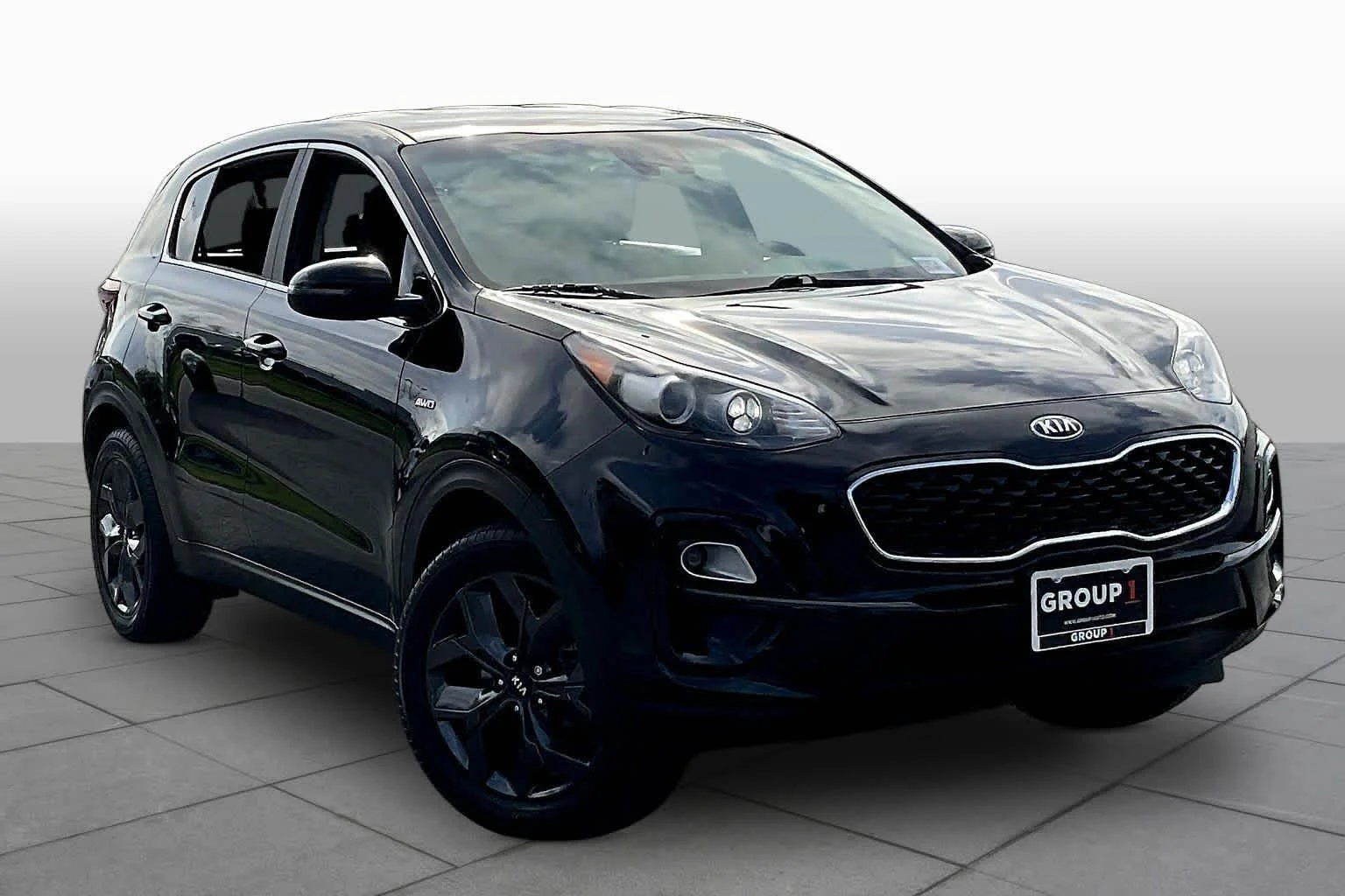 Used 2022 Black Cherry Kia LX image 4