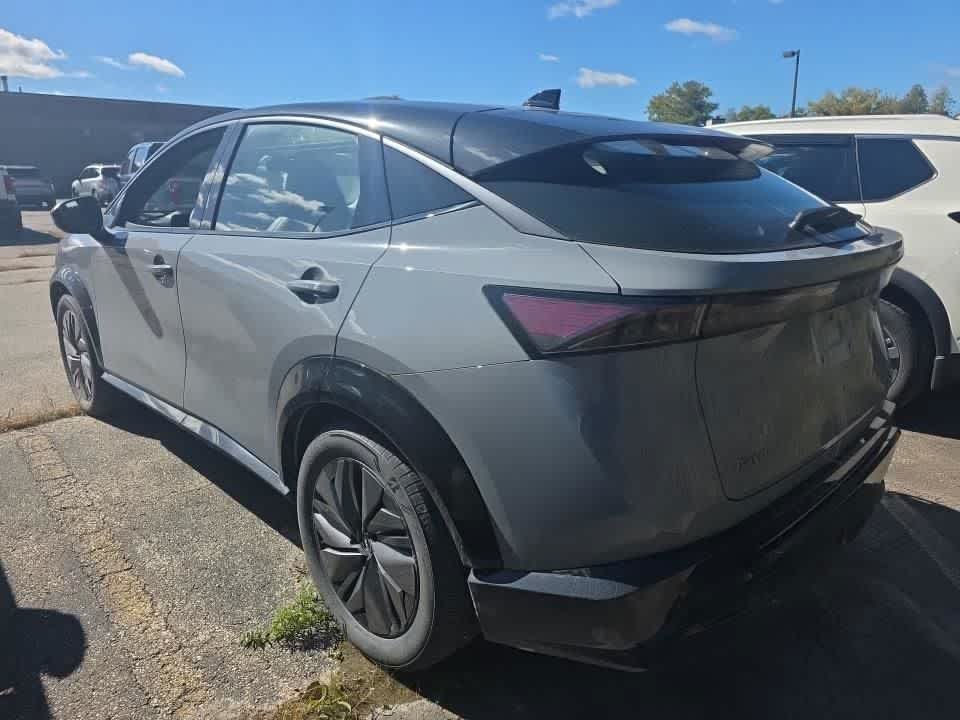 Used 2024 Boulder Gray Pearl/Black Diamond Pearl Nissan EVOLVE+ image 3
