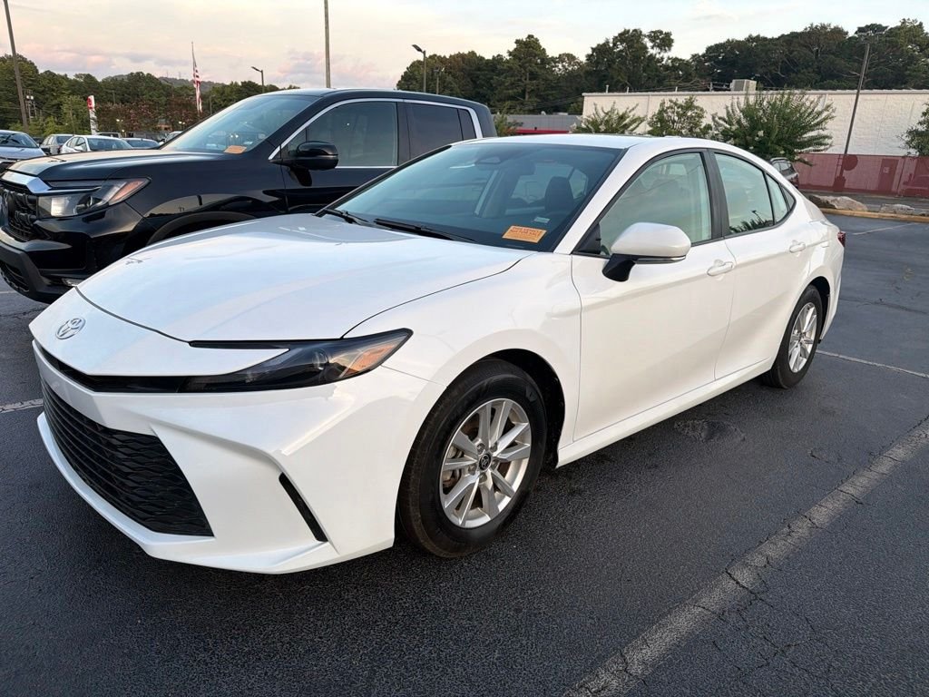 Used 2025 White Toyota LE image 1