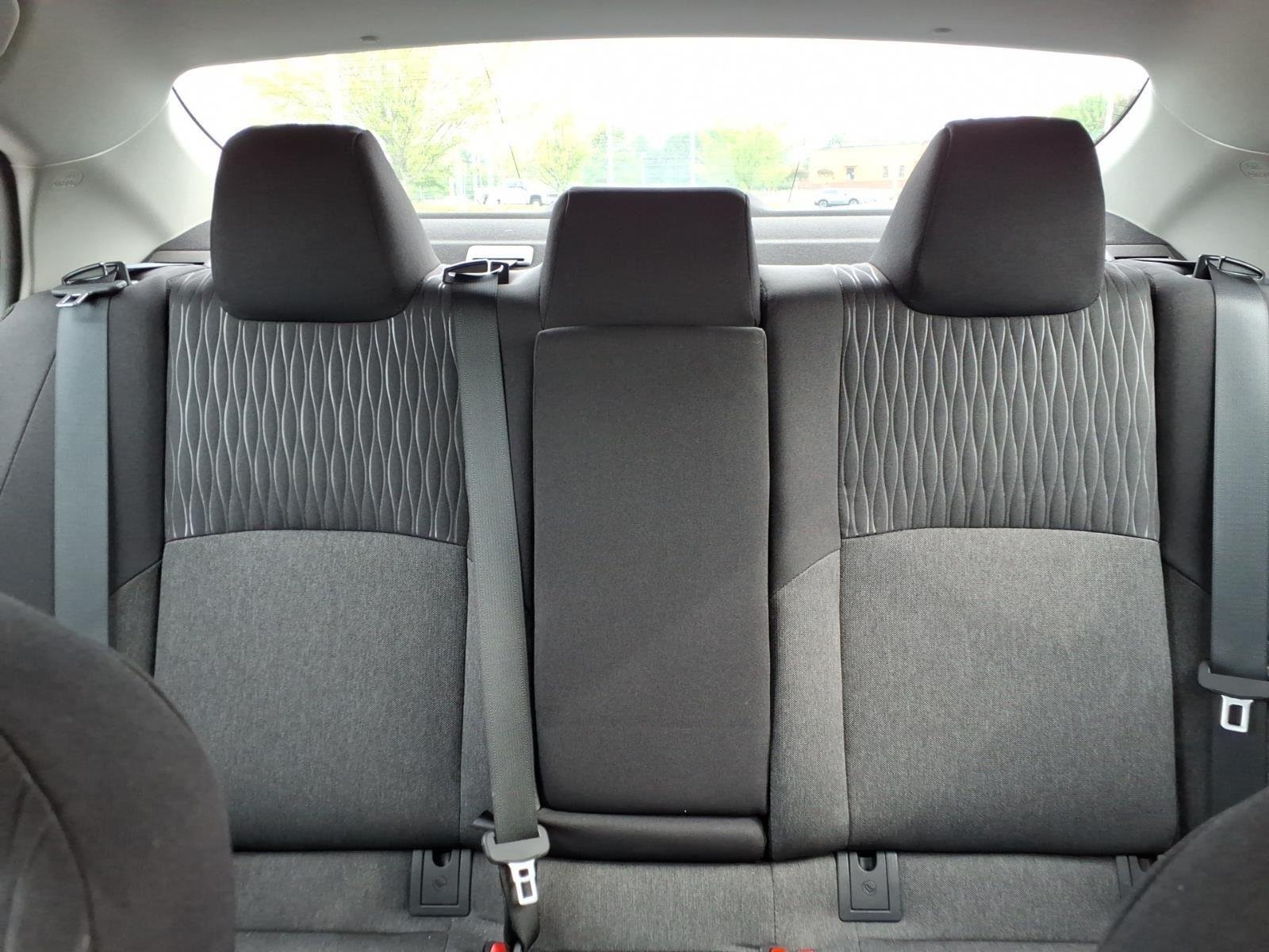 Used 2025 Reservoir Blue Toyota LE image 21