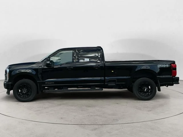 Used 2025 Agate Black Metallic Ford Lariat image 2