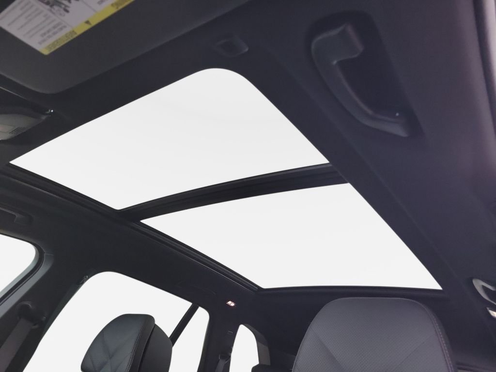 New 2026 Mineral White Metallic BMW xDrive50e image 16