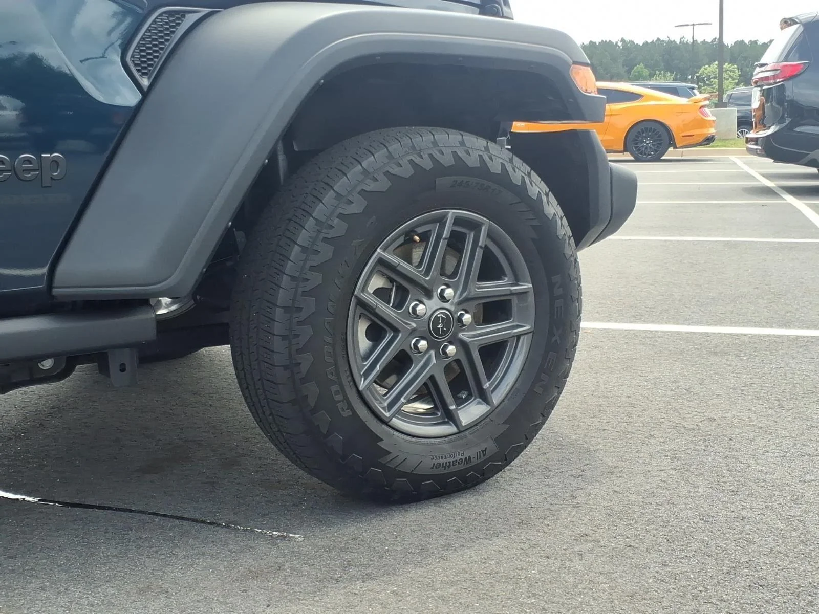 Used 2025 Fathom Blue Pearlcoat Jeep Sport S image 11