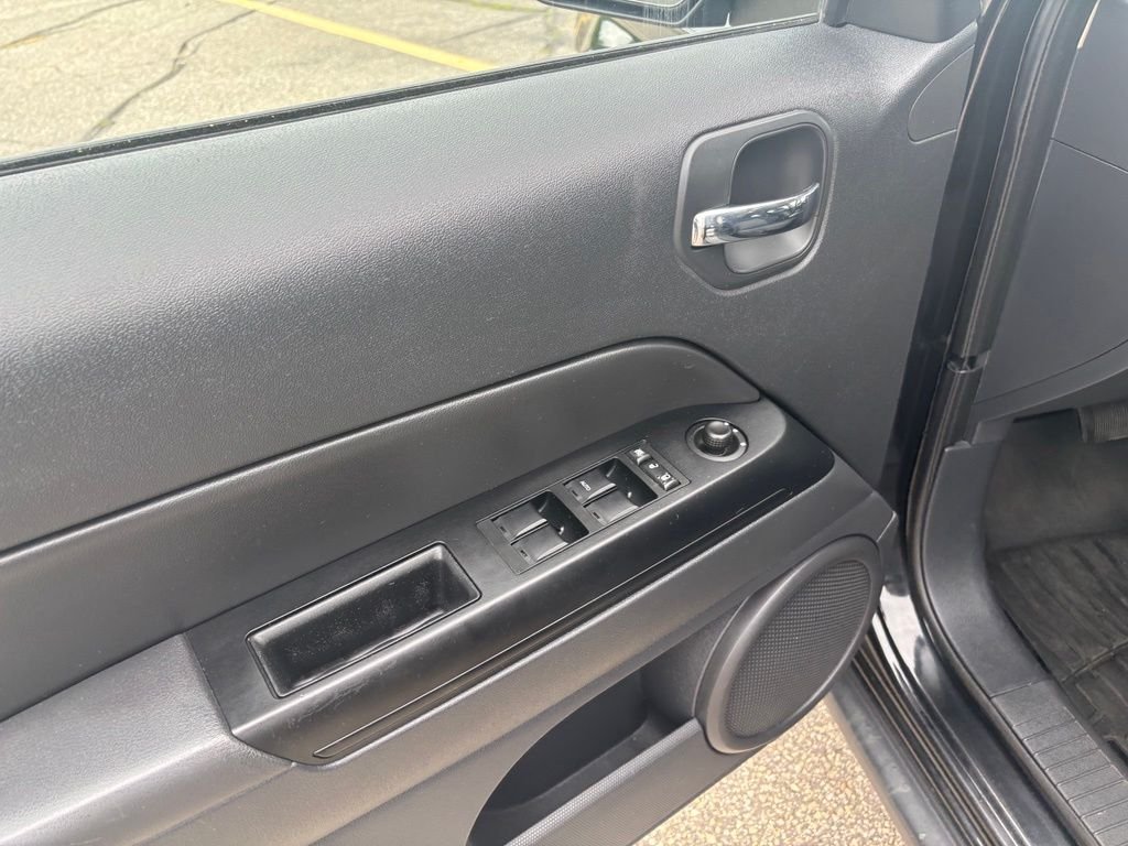 Used 2010 Black Jeep Sport image 13