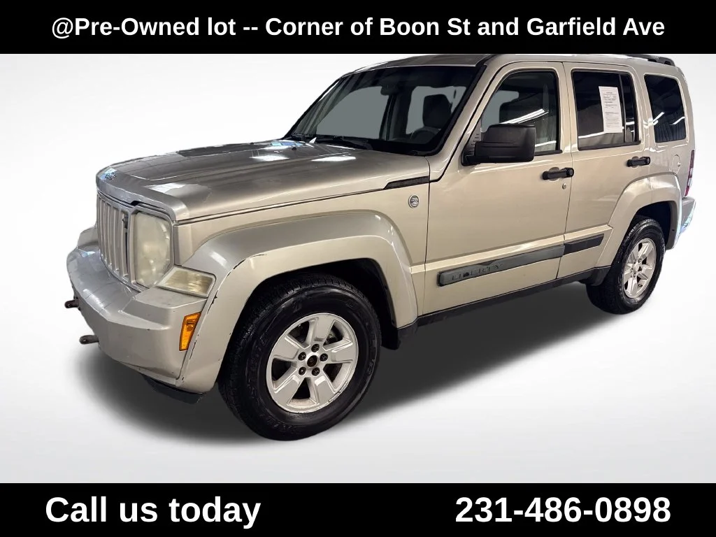 Used 2009 Gray Jeep Sport image 1