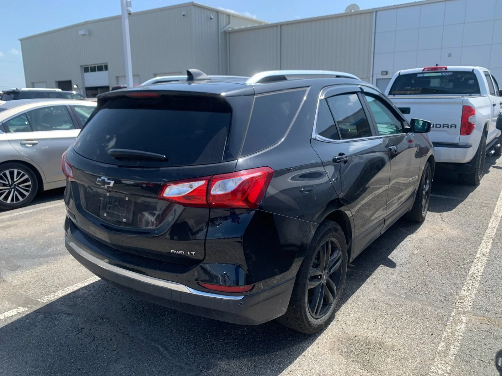 Used 2021 Chevrolet Equinox LT with VIN 3GNAXUEV5ML395305 for sale in Triadelphia, WV