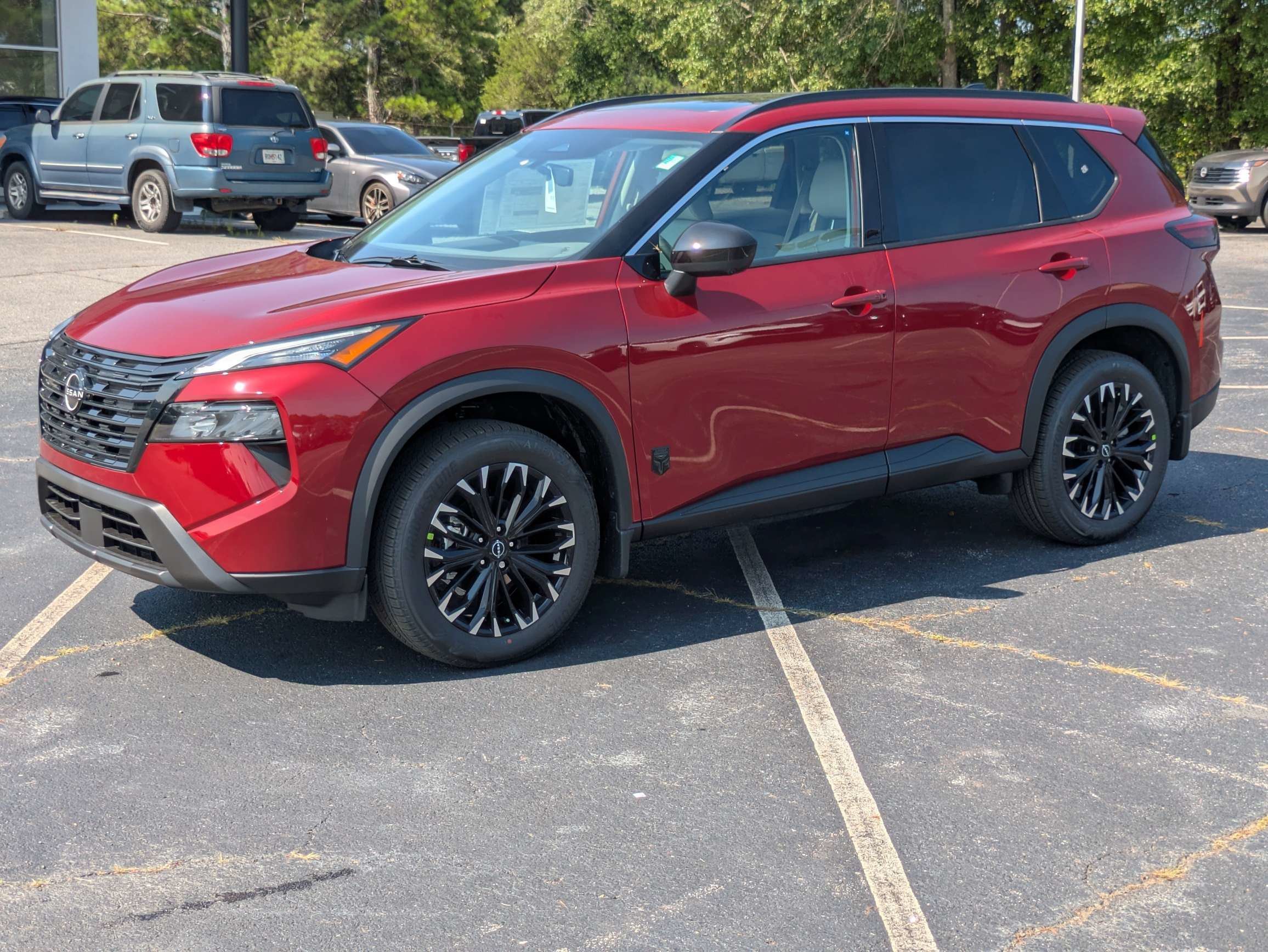 New 2026 Red Nissan Dark Armor image 4