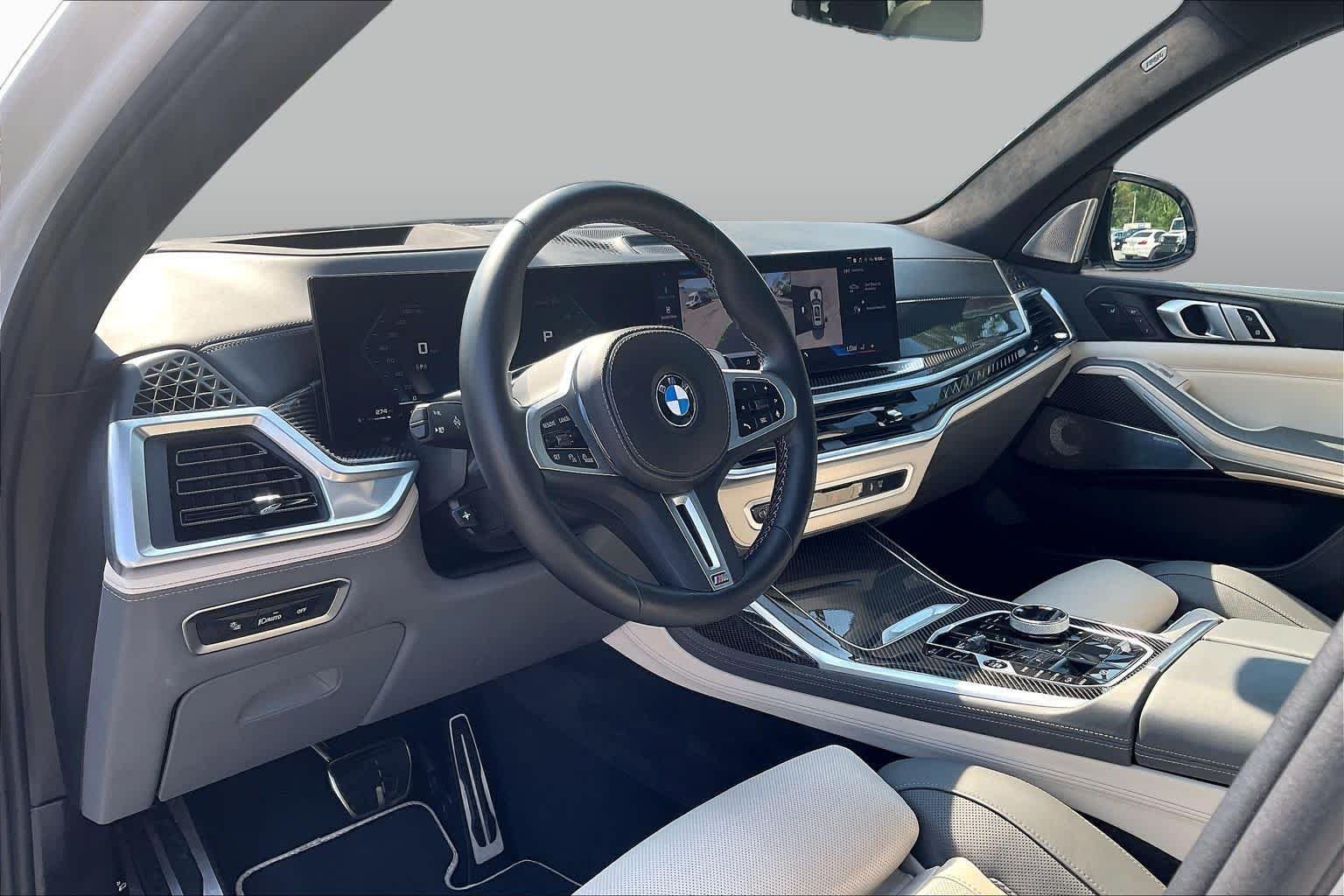 Certified Used 2024 Mineral White Metallic BMW M60i image 17