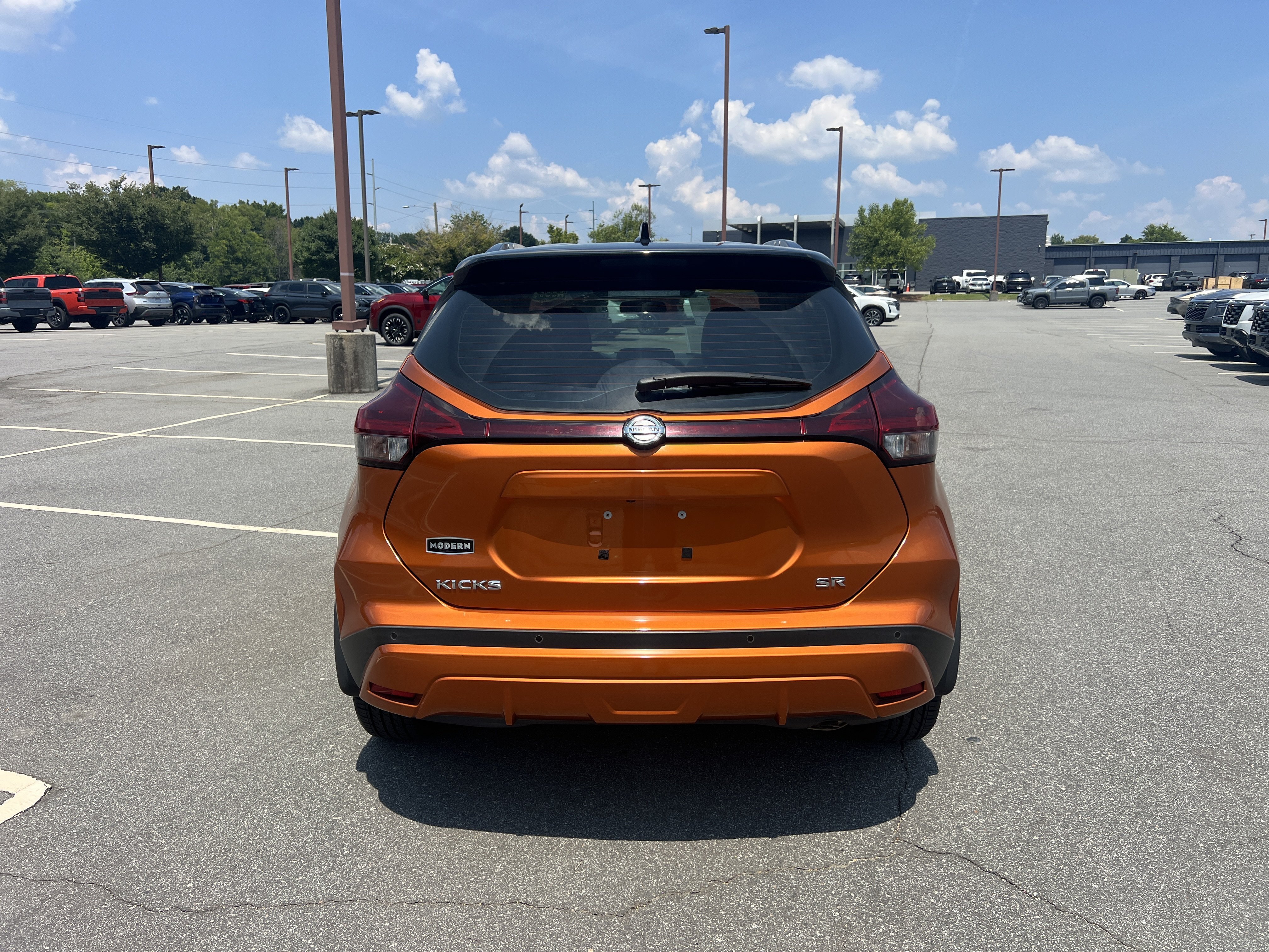 Used 2021 Monarch Orange/Super Black Nissan SR image 6
