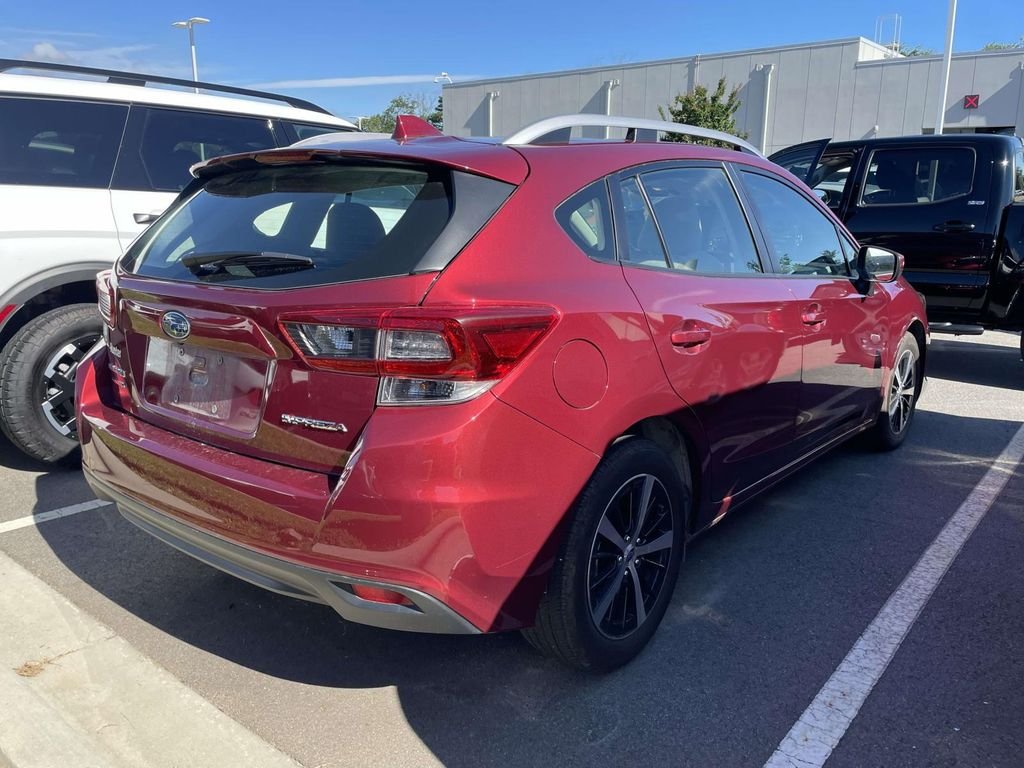 Used 2023 Crimson Red Pearl Subaru Premium image 5
