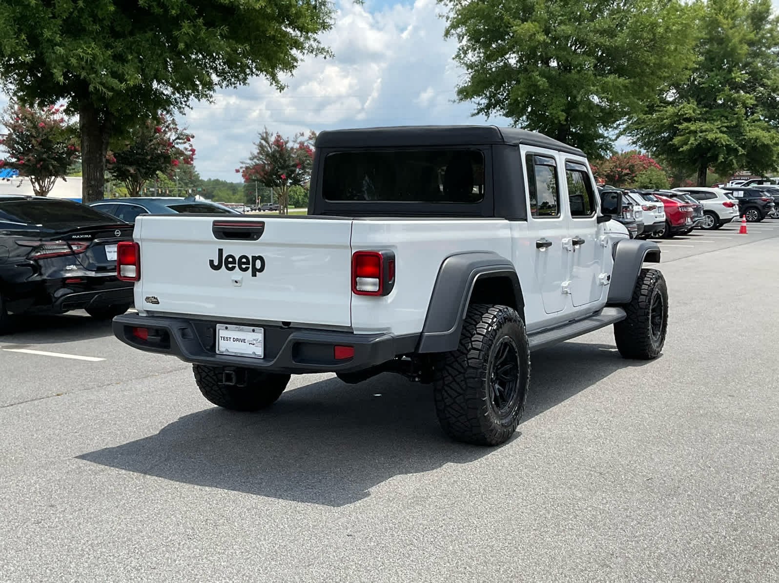 Used 2025 Bright White Clearcoat Jeep Sport image 5