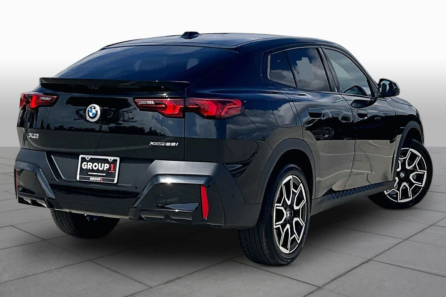 Used 2026 Black Sapphire Metallic BMW xDrive28i image 12