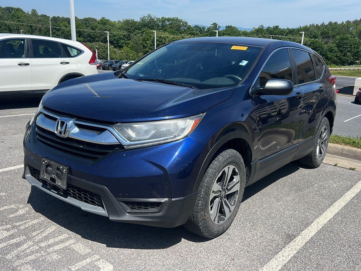 Used 2019 Obsidian Blue Pearl Honda LX image 1