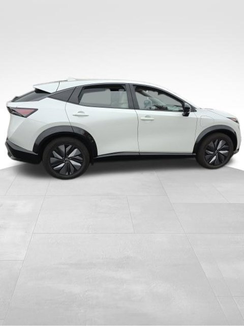 Used 2024 White Nissan EVOLVE+ e-4ORCE image 4