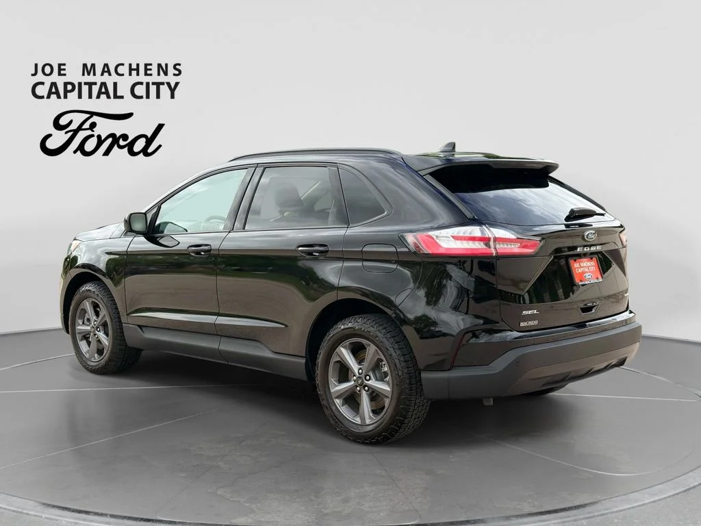 Used 2024 Agate Black Metallic Ford SEL image 7