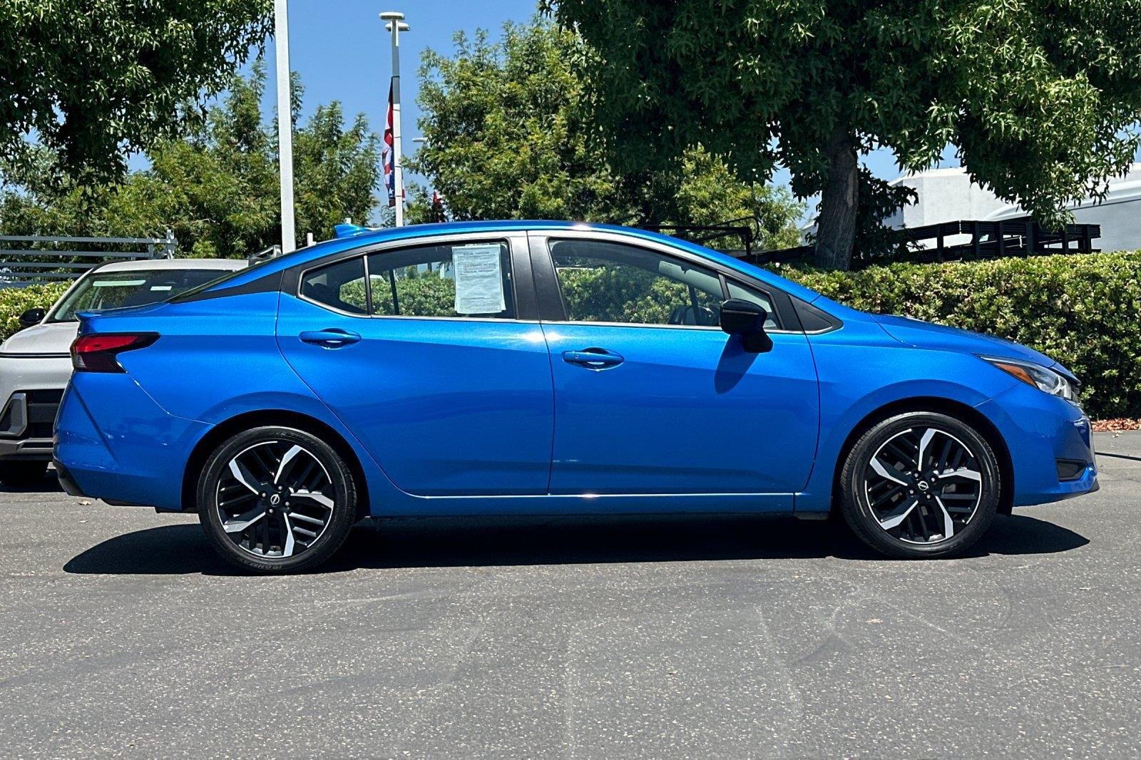 Used 2024 Electric Blue Metallic Nissan SR image 3