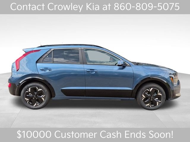 New 2026 Mineral Blue Kia WIND image 2