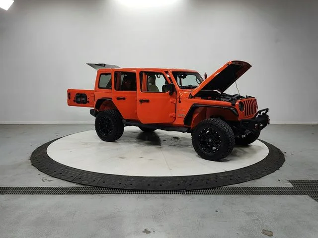 Used 2018 Orange Jeep Unlimited Sahara image 9