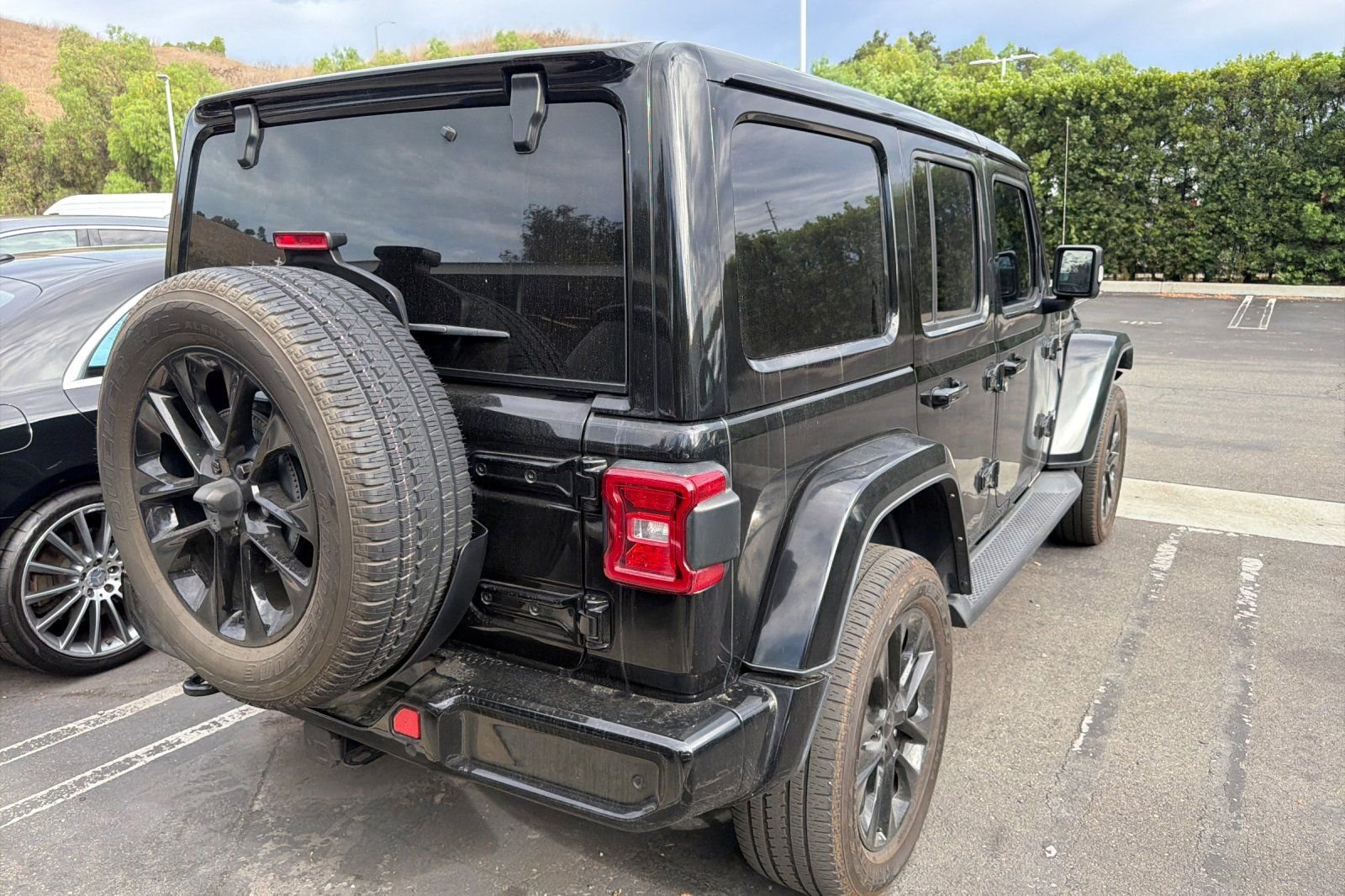 Used 2022 Black Jeep Unlimited Sahara High Altitude image 5
