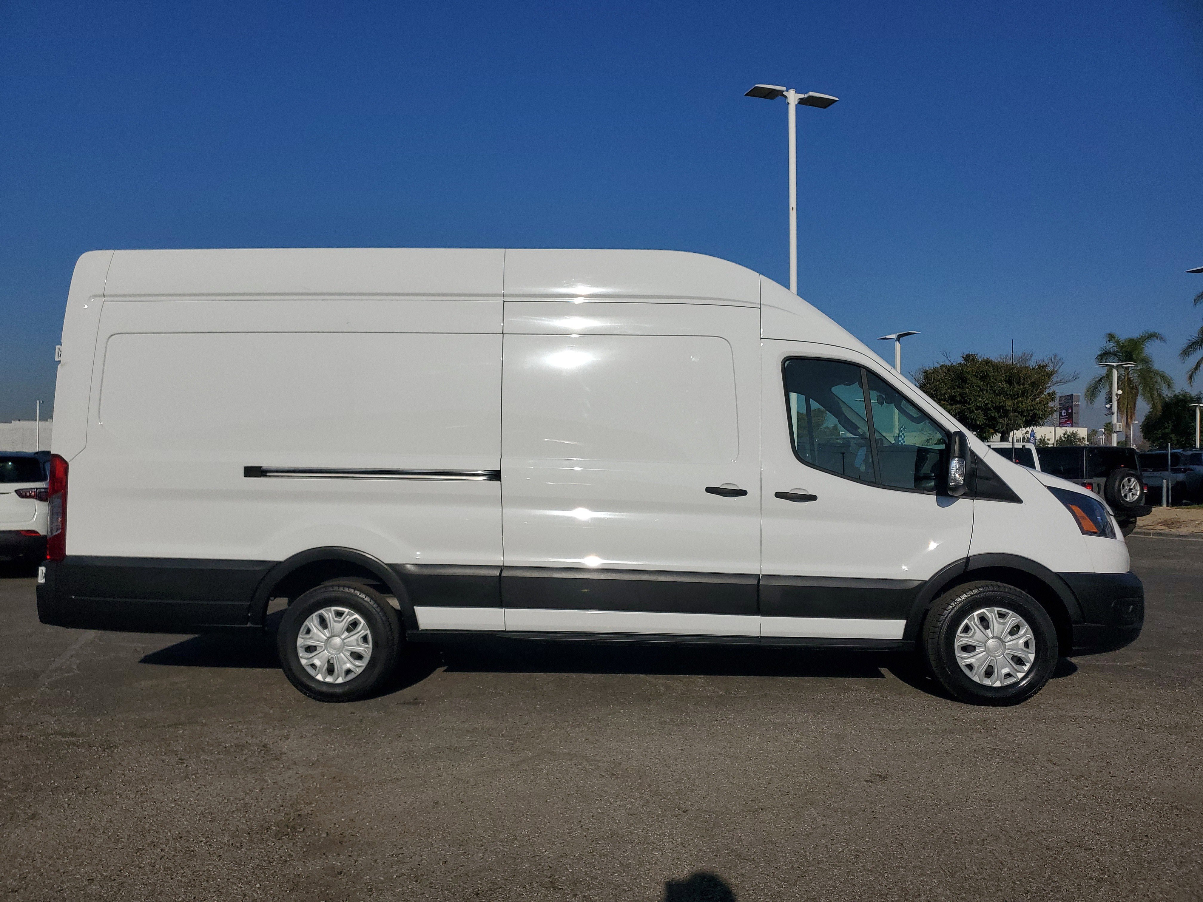Used 2022 Ford E-Transit Cargo Van Base with VIN 1FTBW3XK5NKA46631 for sale in Ontario, CA