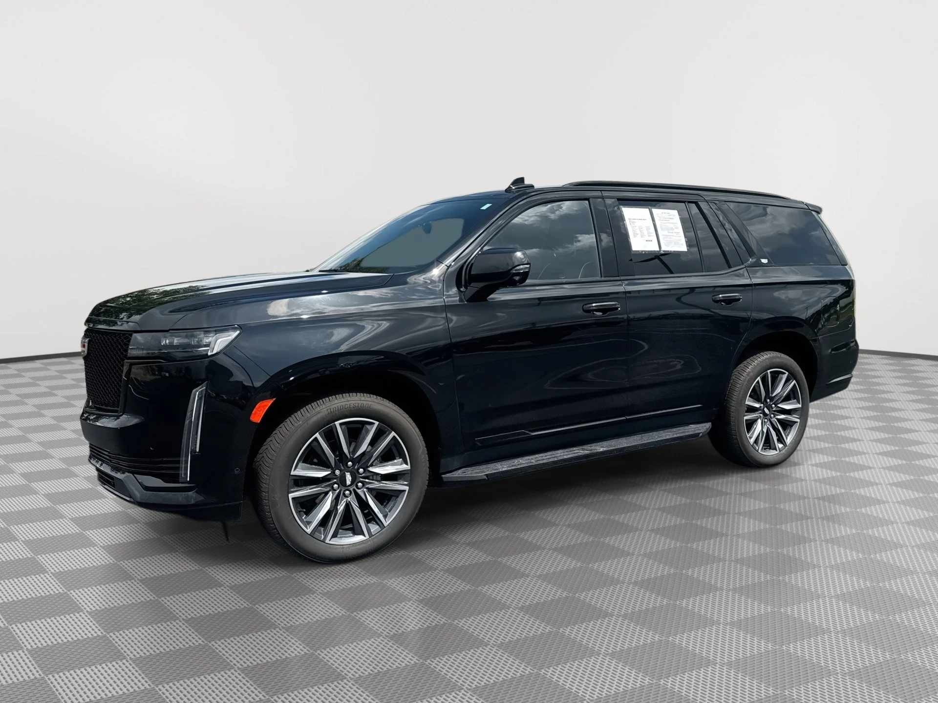 Used 2022 Black Raven Cadillac Sport image 1