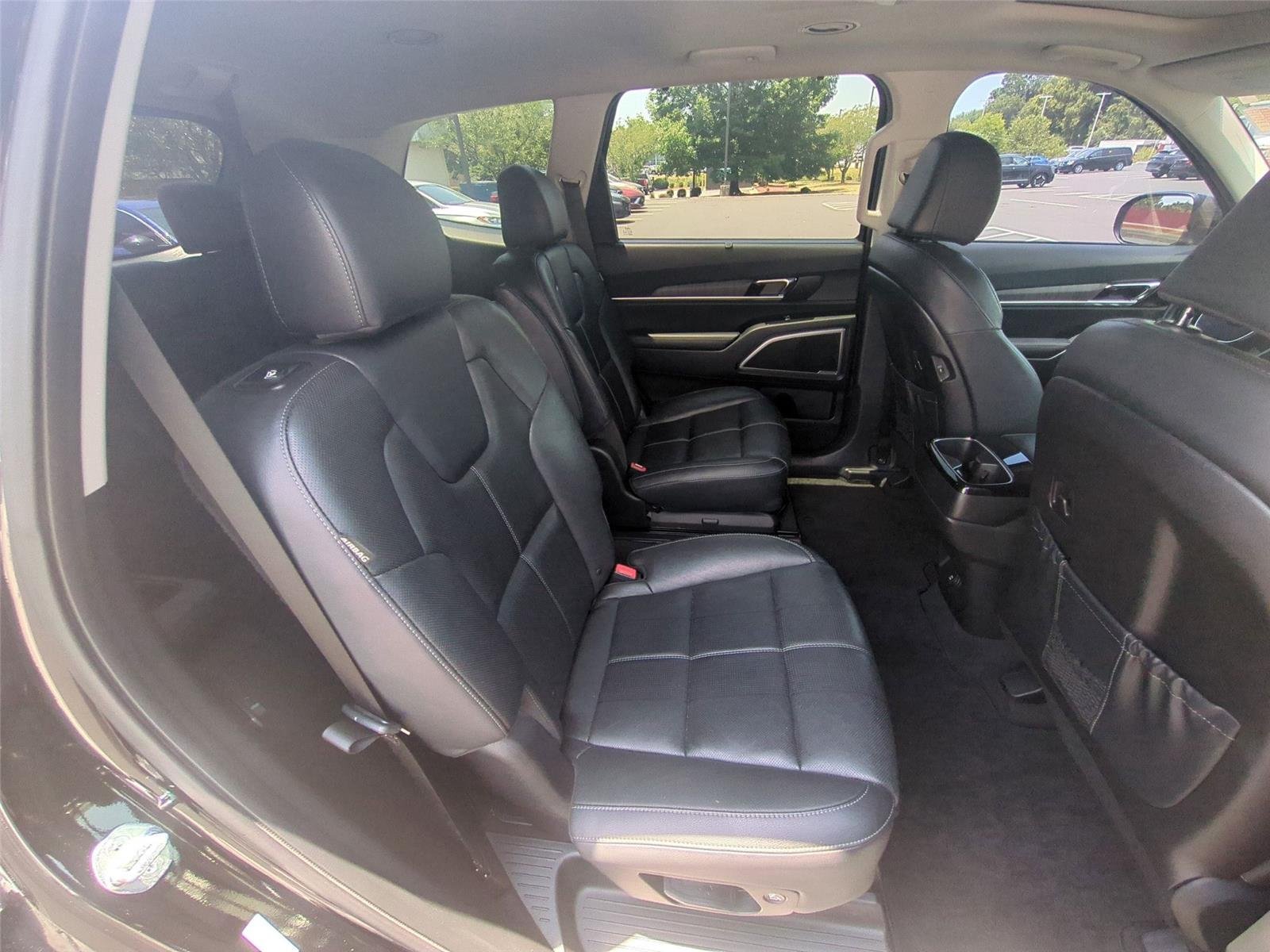 Used 2024 Ebony Black Kia EX image 53