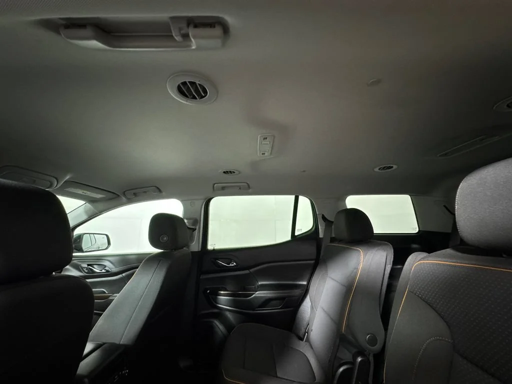 Used 2023 EBONY TWILIGHT METALLIC GMC AT4 image 13