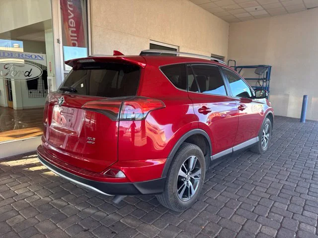 Used 2016 Barcelona Red Metallic Toyota XLE image 4