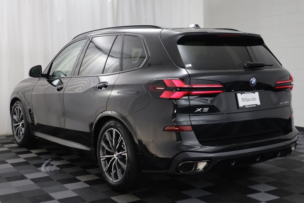 New 2026 Black Sapphire Metallic BMW xDrive50e image 16