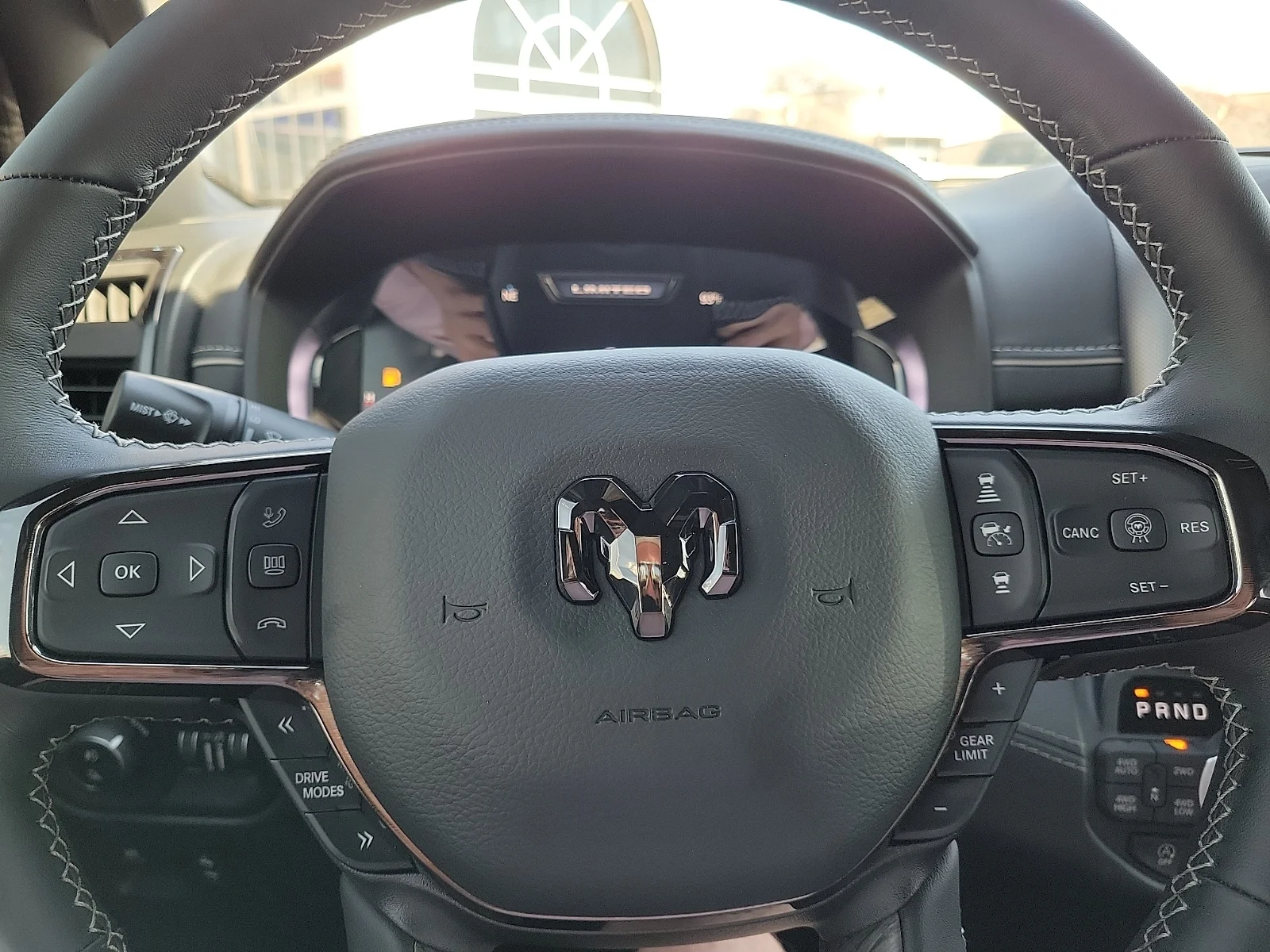 New 2026 Bright White Ram LIMITED CREW CAB 4X4 5