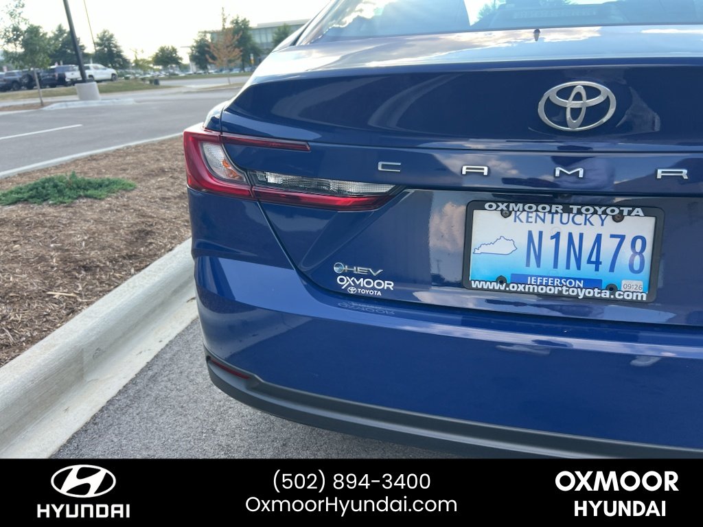 Used 2025 Reservoir Blue Toyota LE image 19