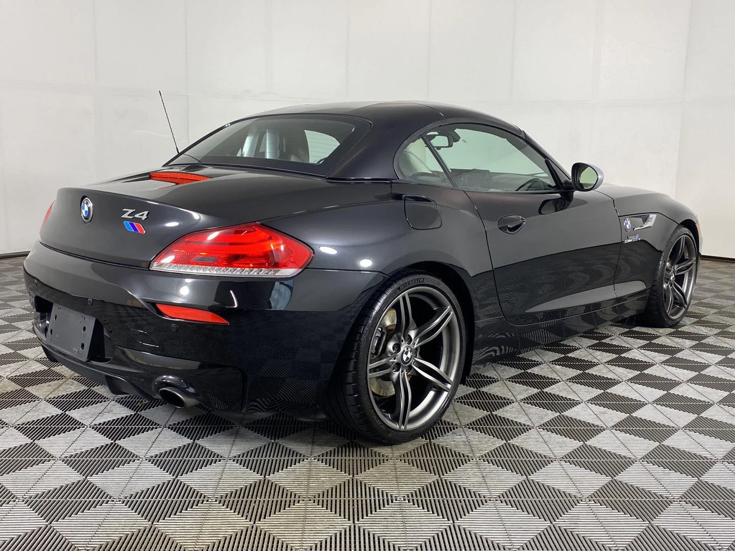 Used 2011 Black Sapphire Metallic BMW sDrive35is image 5