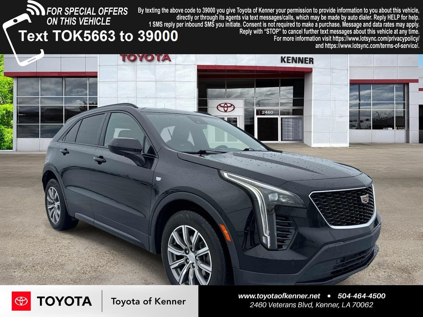 Used 2020 Stellar Black Metallic Cadillac AWD Sport image 1