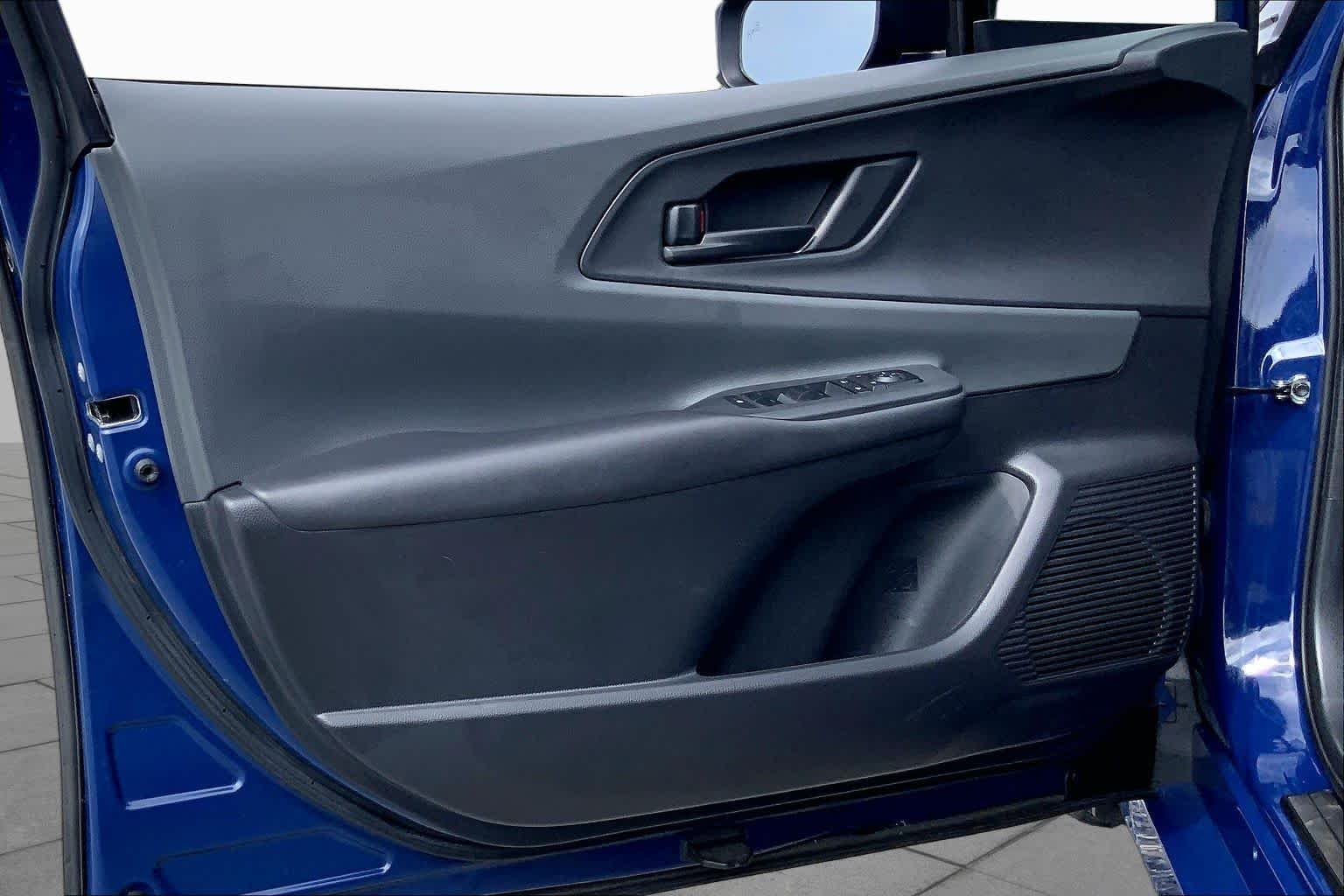 Used 2025 Reservoir Blue Toyota LE image 21