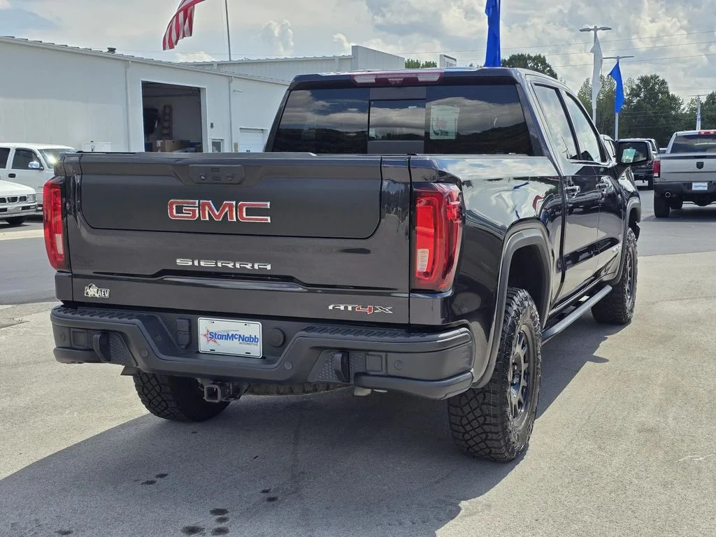 Used 2023 Titanium Rush Metallic GMC AT4X image 7